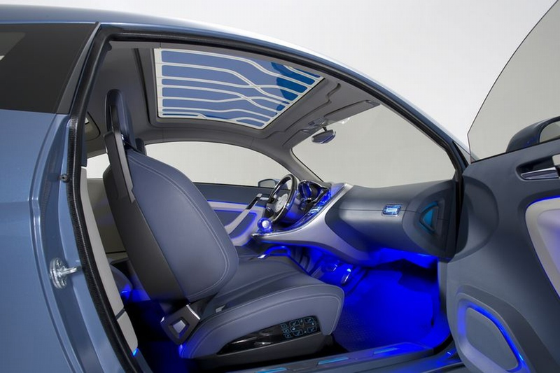 Illustration for article titled Mitsubishi iMiEV Sport Air Concept: Similar Body, Tron-Like Interior
